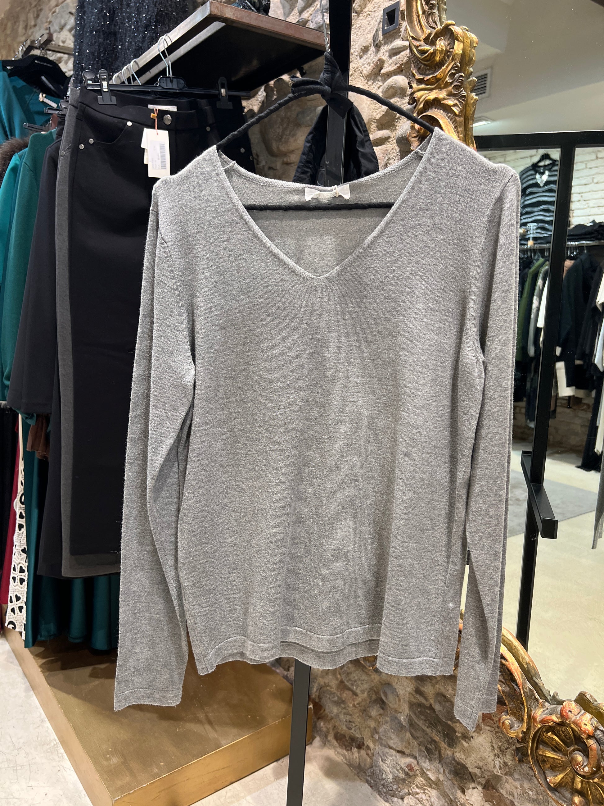 Gray V-neck sweater