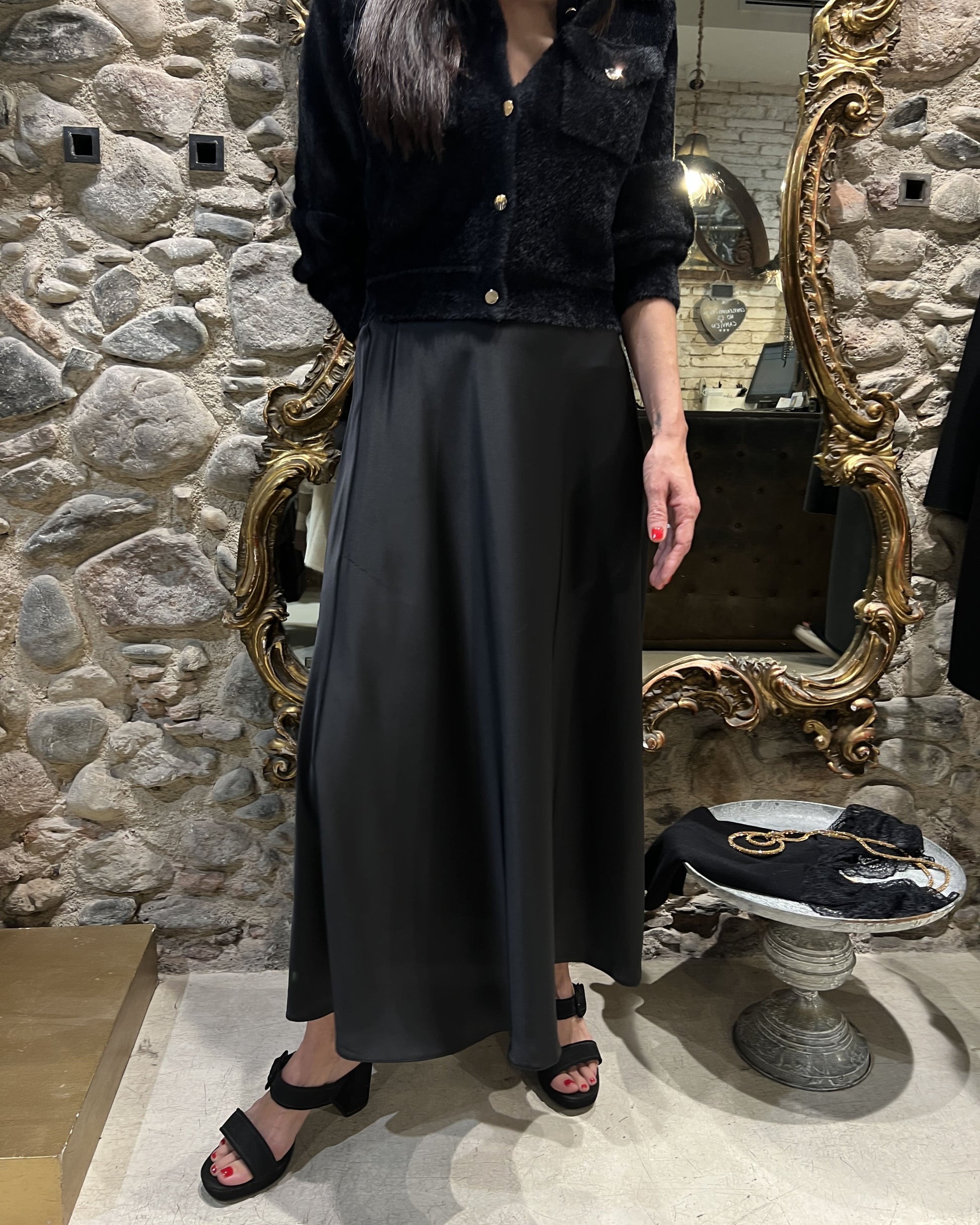 Jupe évasée en satin noir