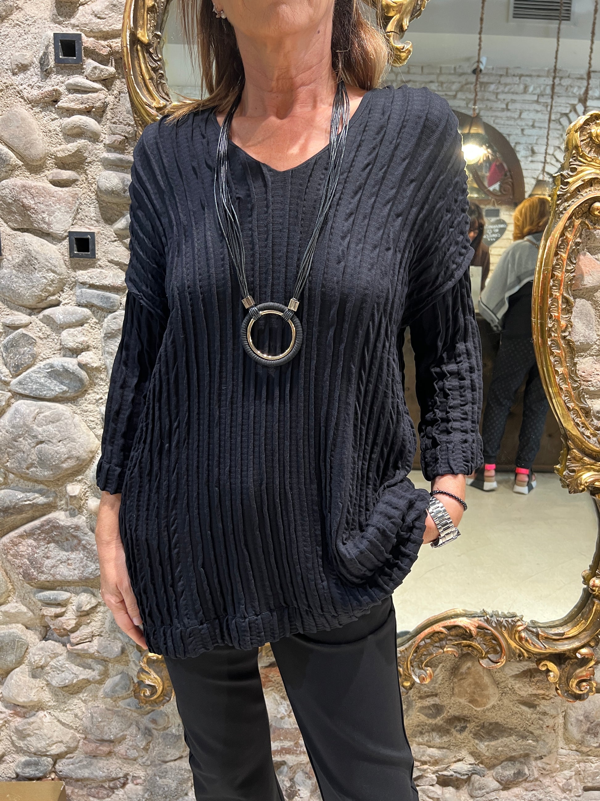 V-neck pleated sweater