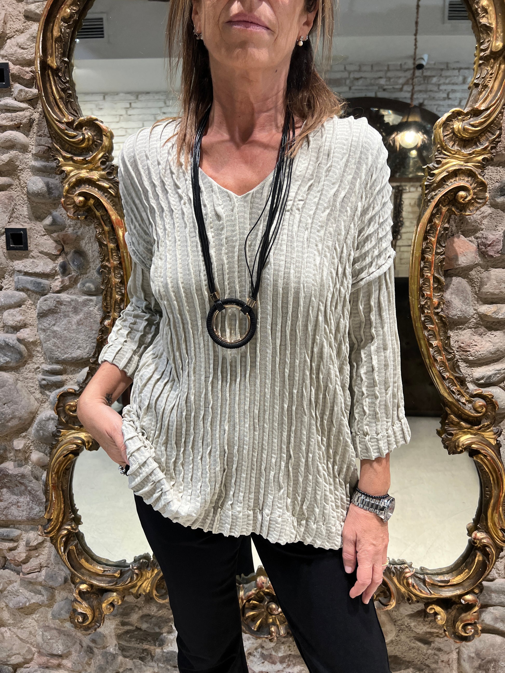 Pull plissé à col en V