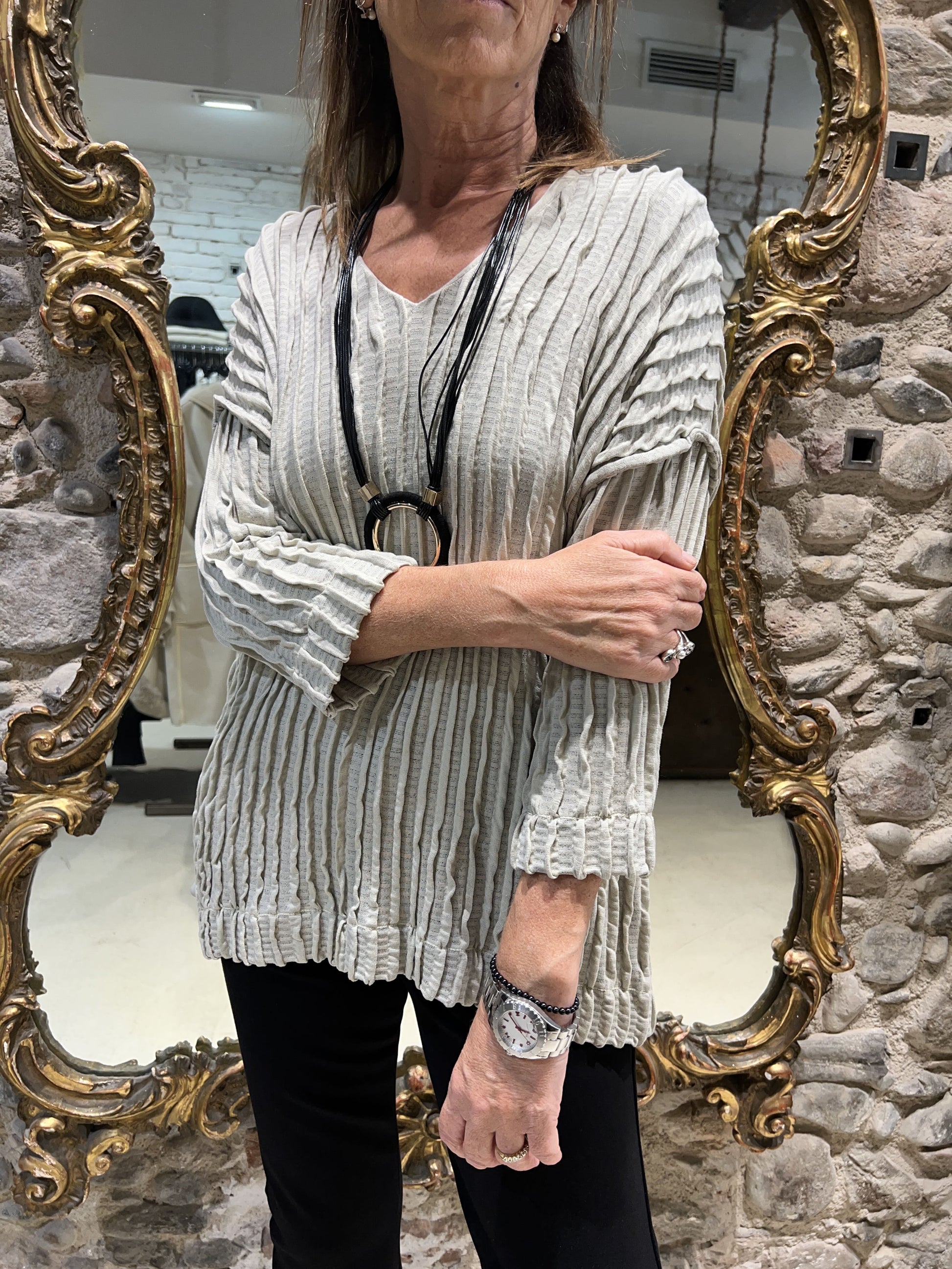 Pull plissé à col en V