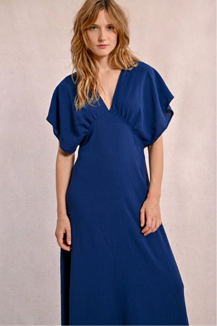 Long flowing dress with short, wide sleeves