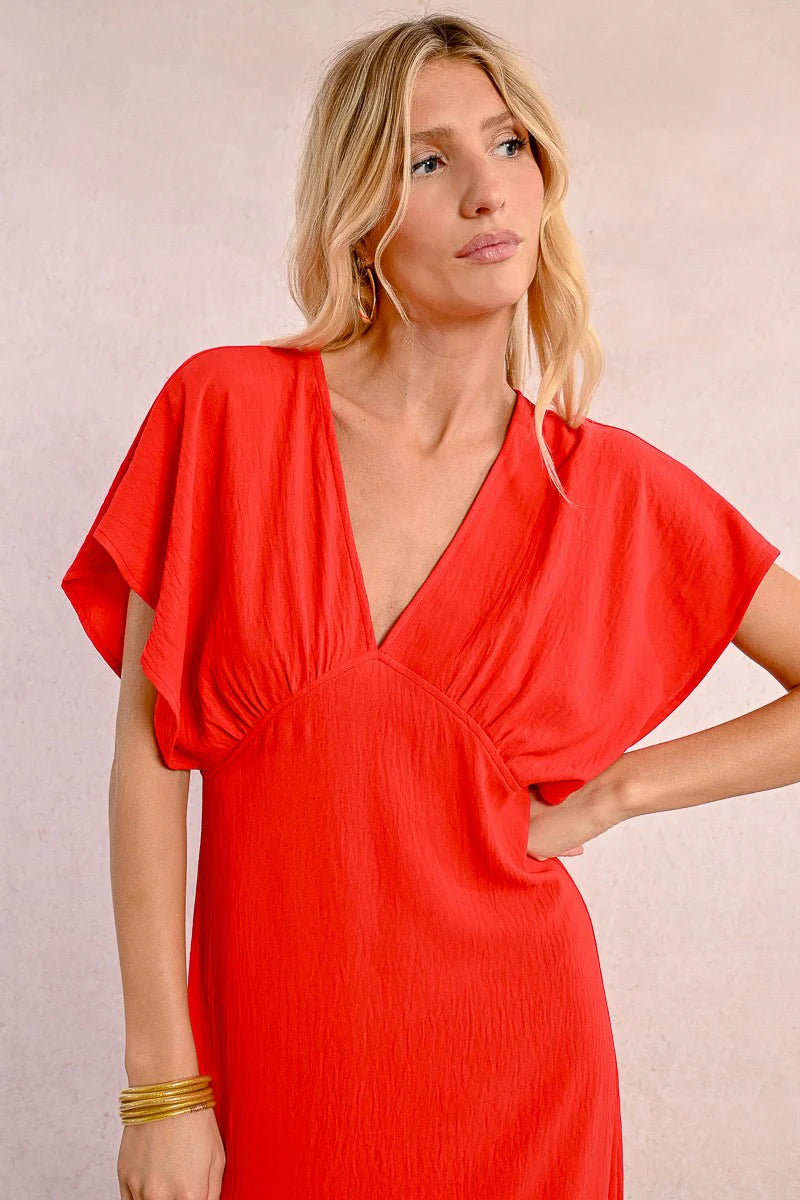 Long flowing dress with short, wide sleeves