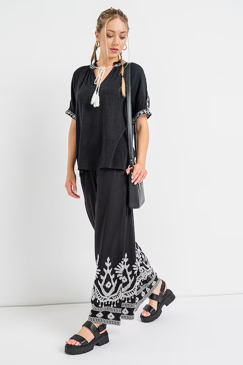 Pantalon palazzo noir avec bordure