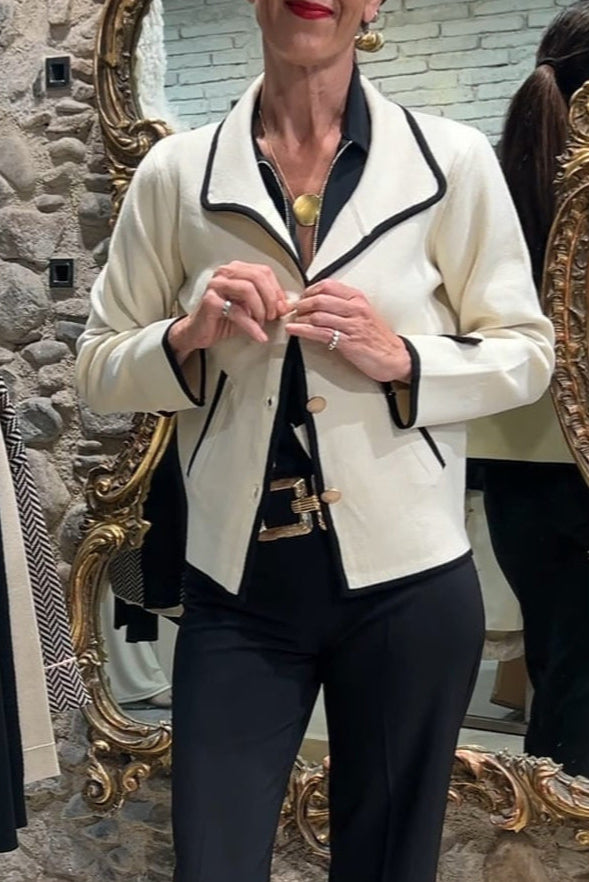 Beige jacket with black trim