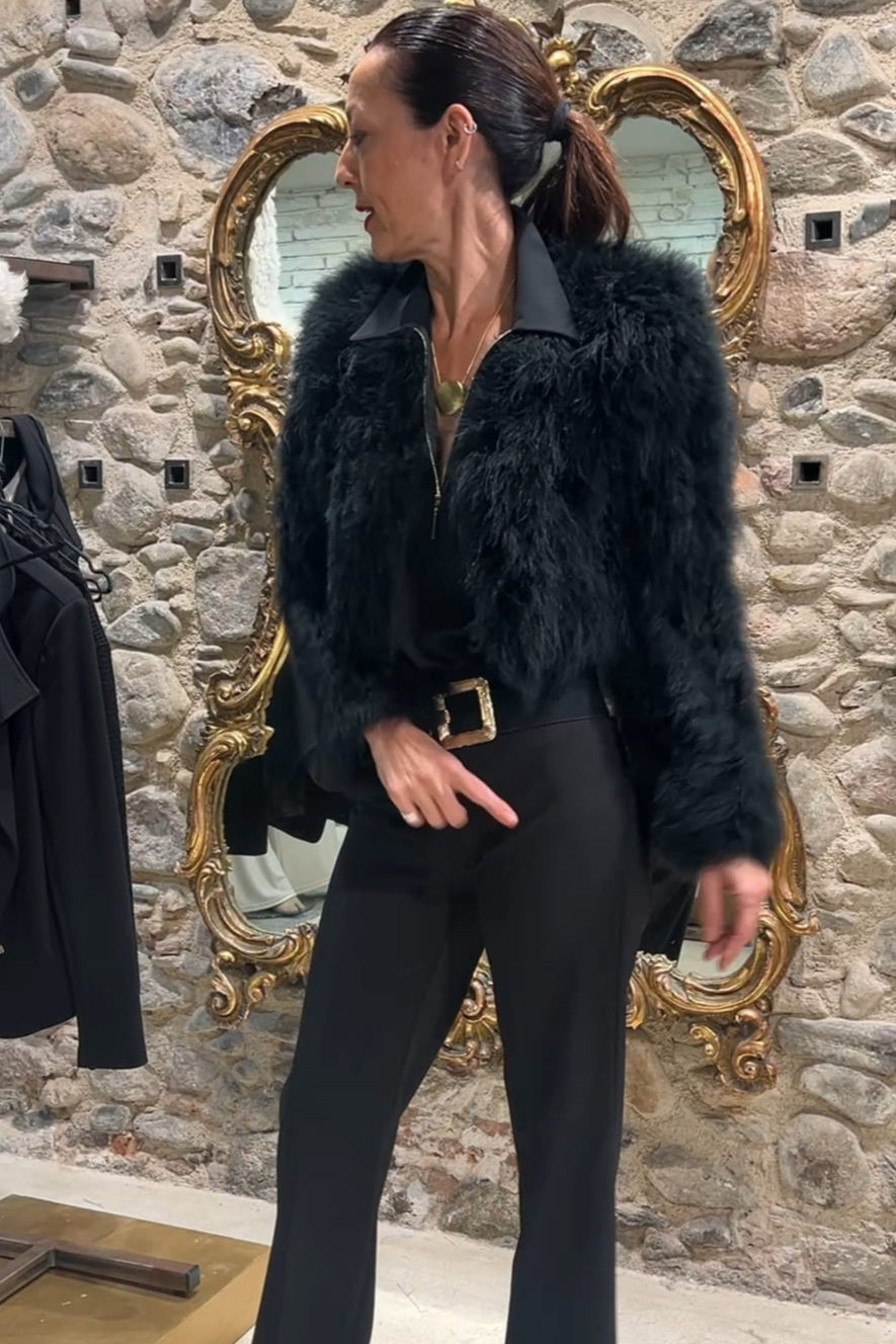 Chaqueta torera pelo y plumas