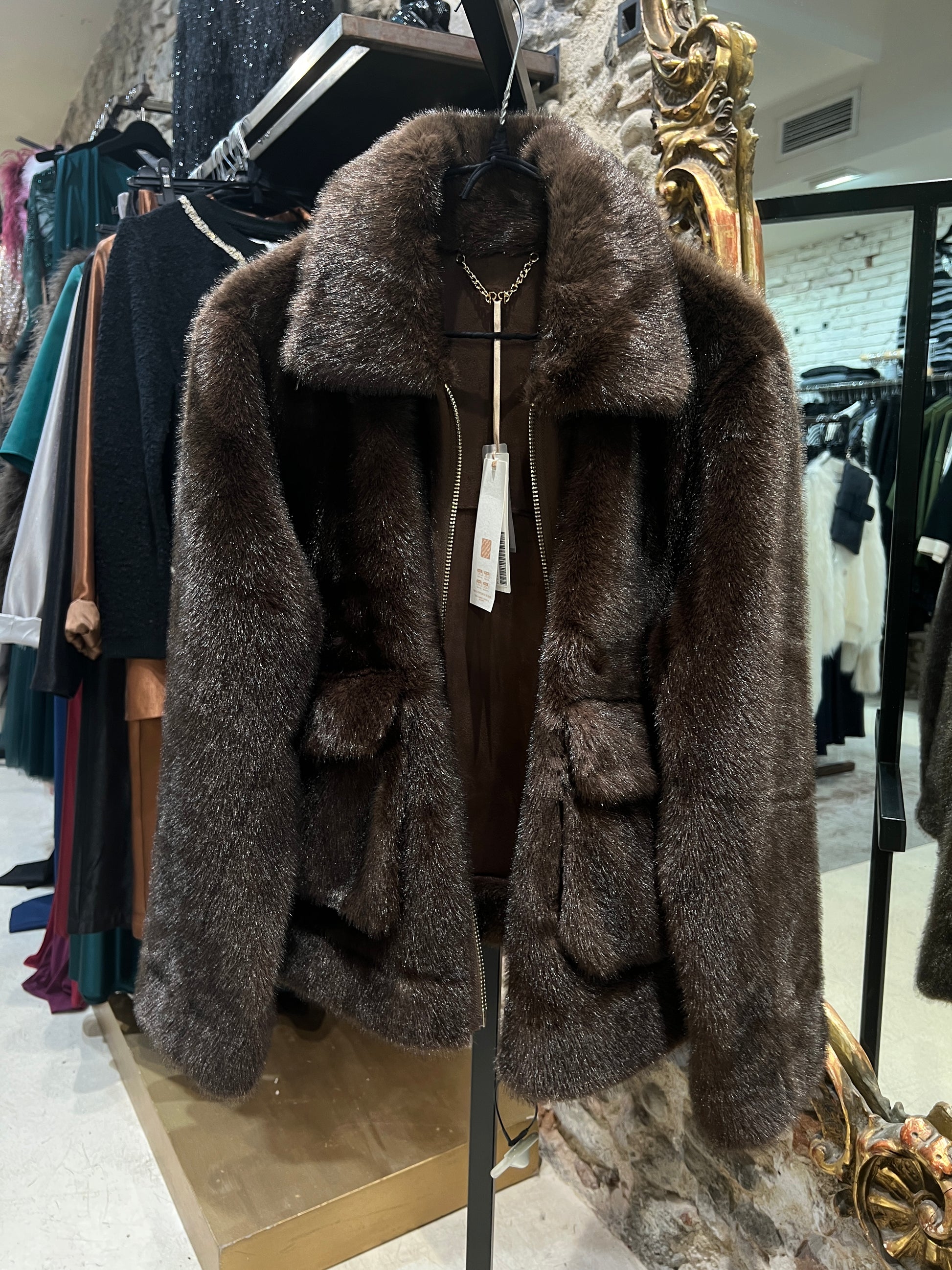 Chaqueta de pelo con bolsillos