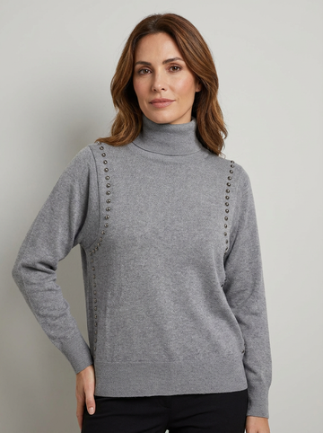 Jersey gris con tachuelas elegantes