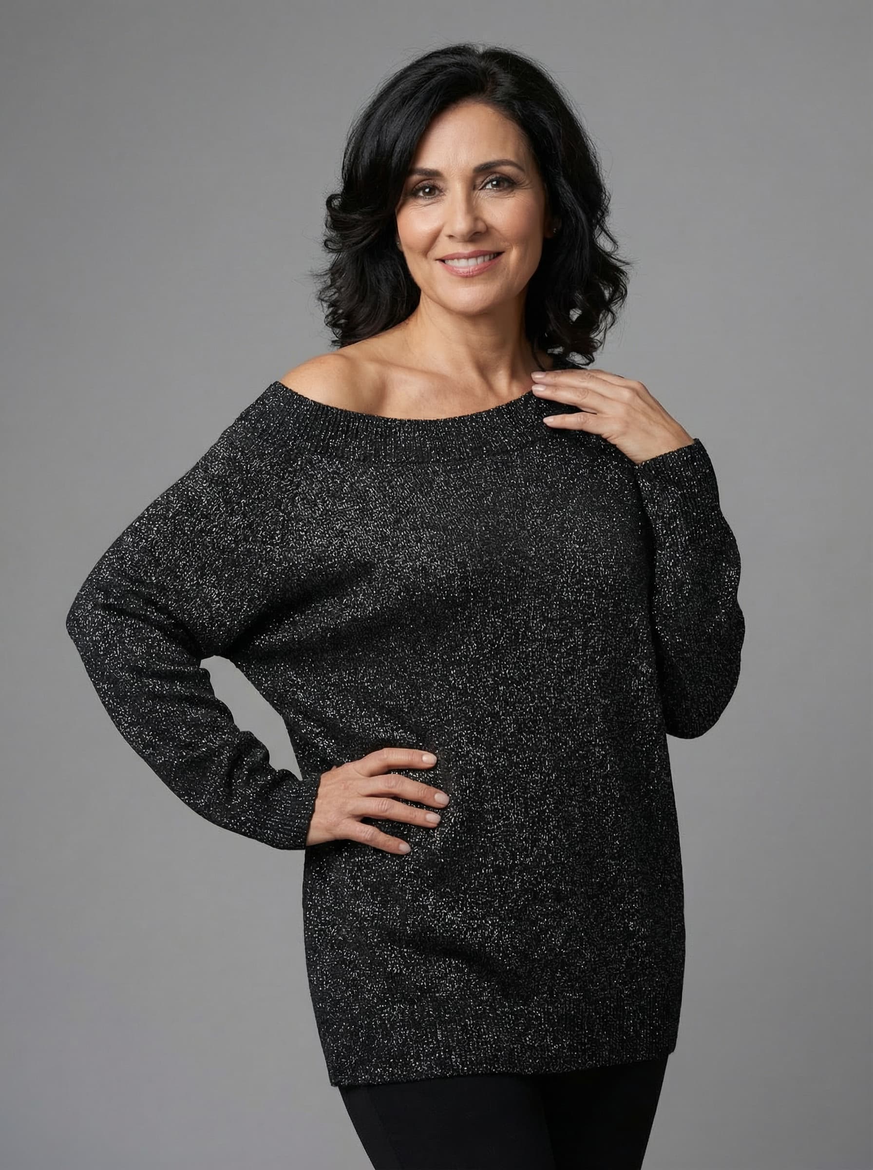 Jersey negro lurex hombro caído