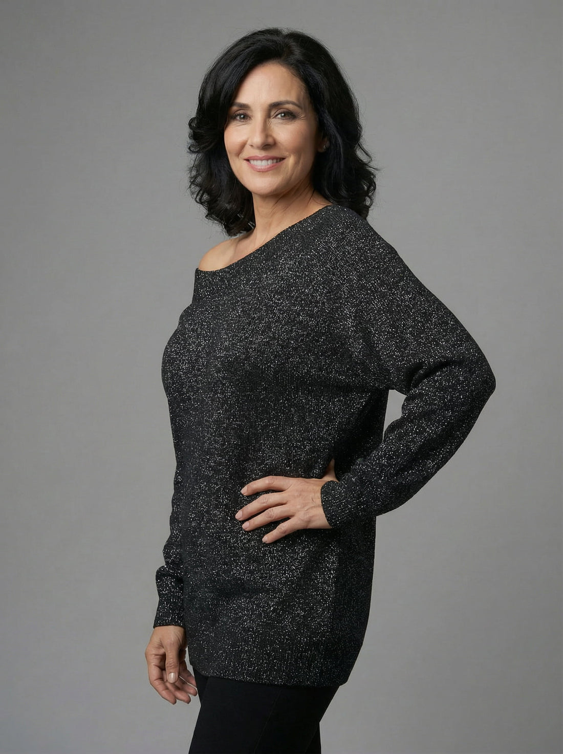 Jersey negro lurex hombro caído