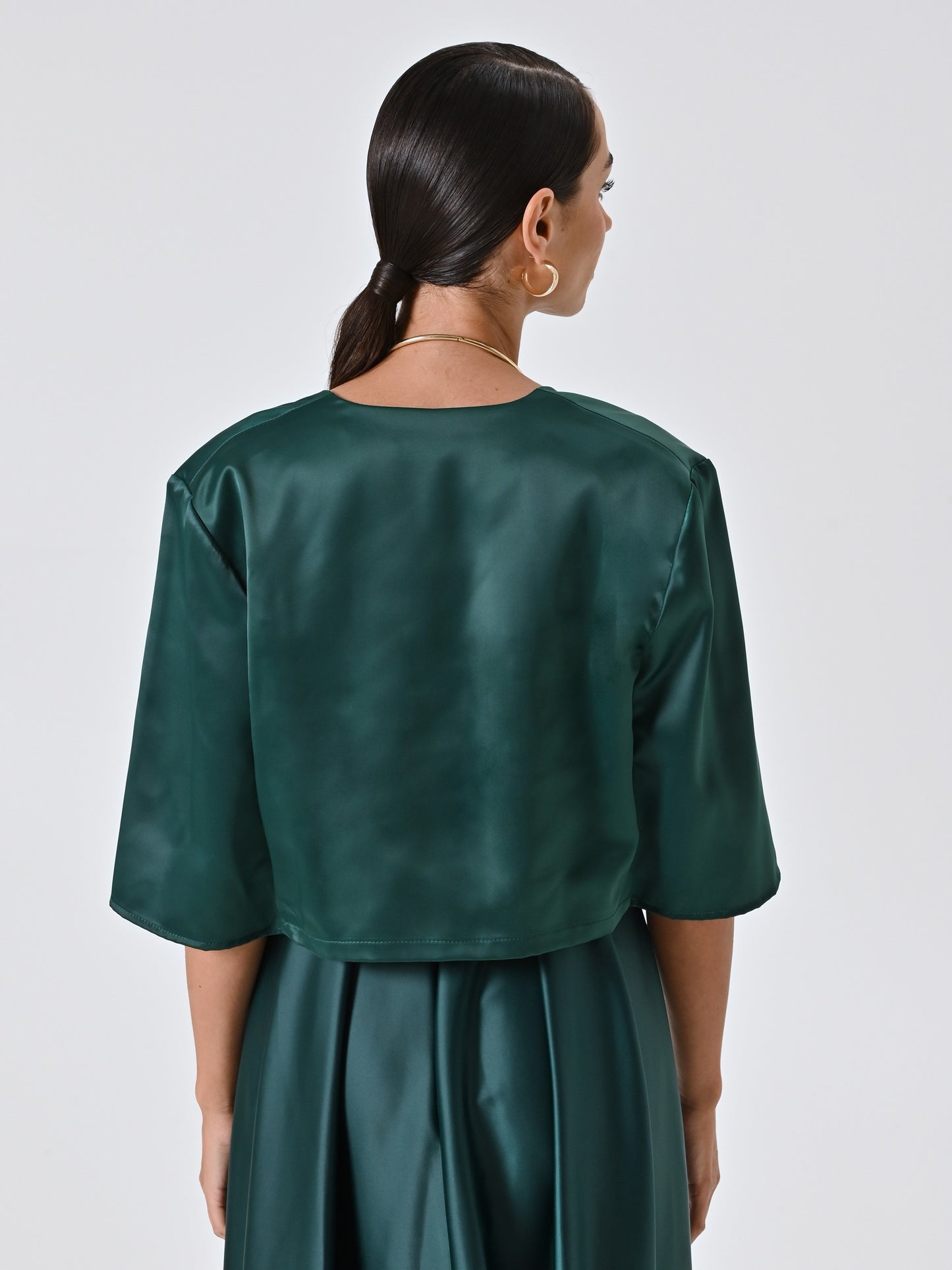 Bolero en satén verde